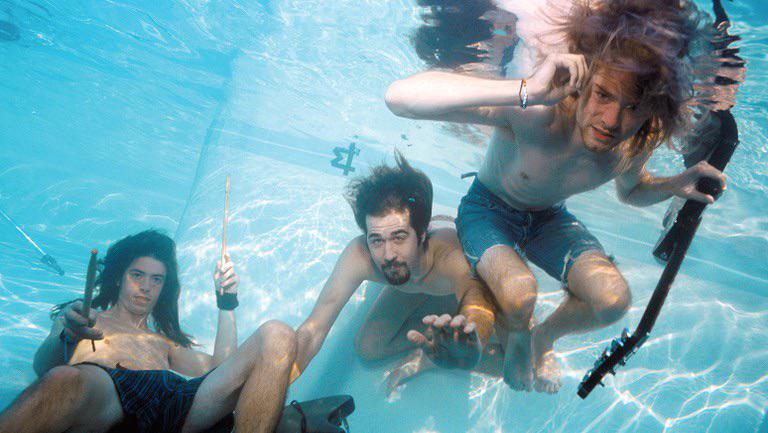 Nirvana durante sessão de fotos de seu álbum Nevermind, 1991.